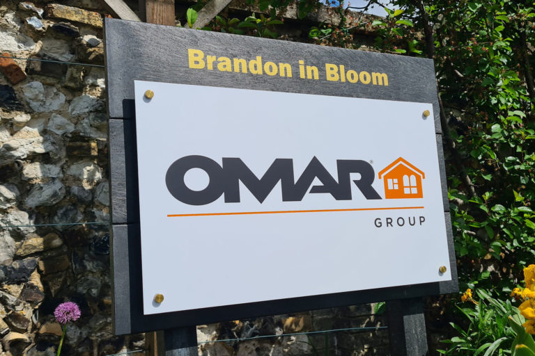 Omar sponsor sign for Brandon in Bloom