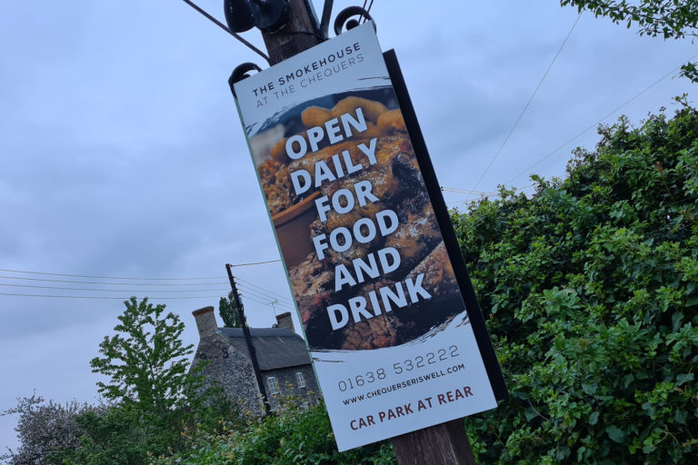 Sign for The Smokehouse at The Chequers